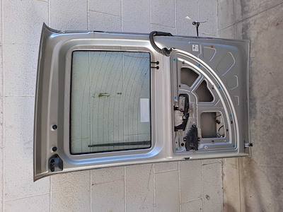 PORTA CARICO POST. A BATTENTE SX.